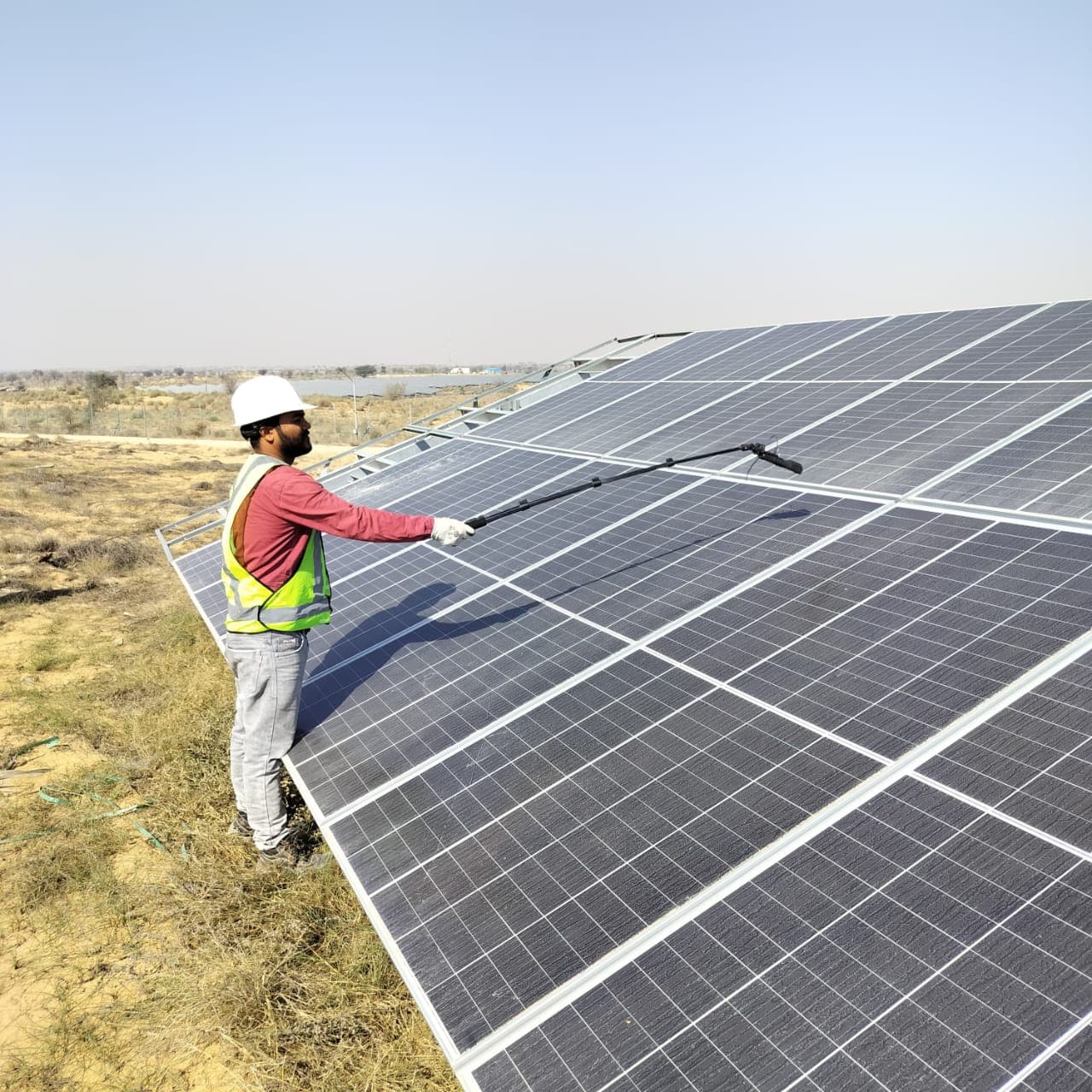 Field technician scanning solar modules on site